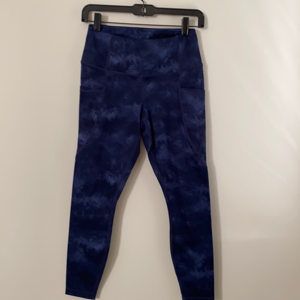 Full length blue and black print workout tight.